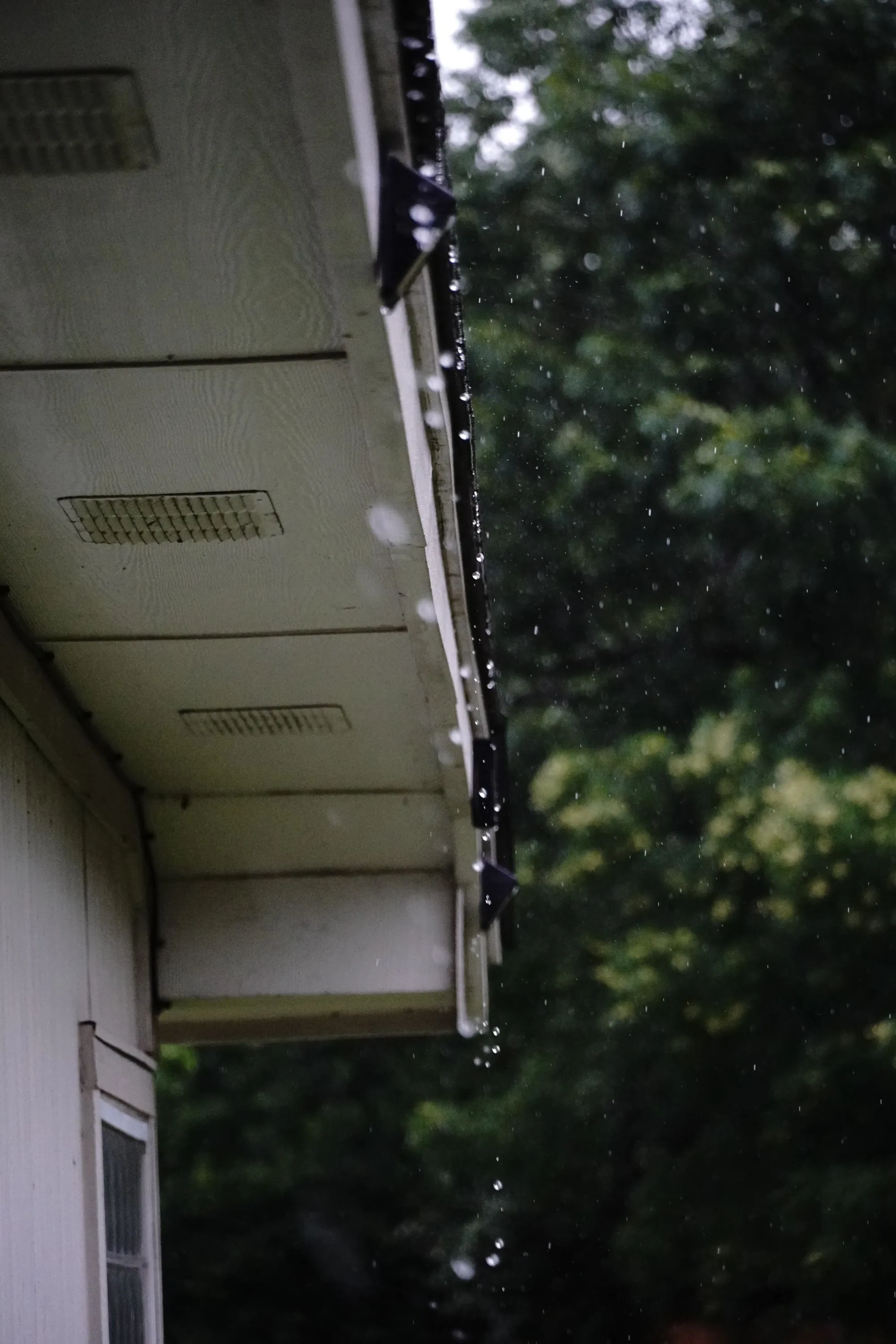 Water staining on a soffit during heavy rain